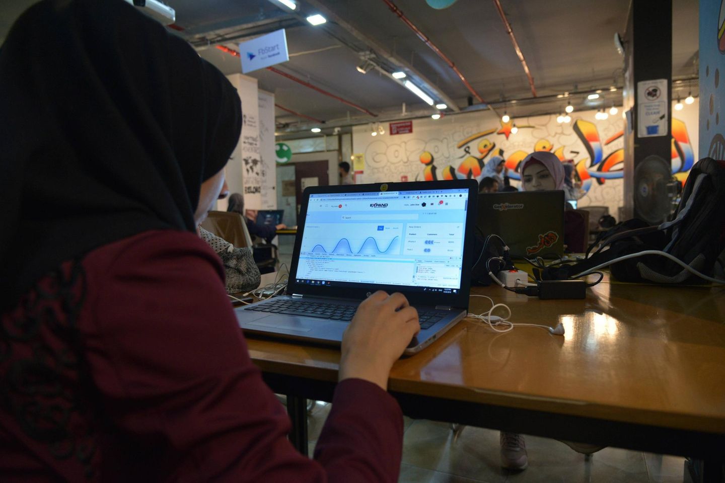 A woman works inside Gaza Sky Geeks, one of several local innovation hubs in the Gaza Strip