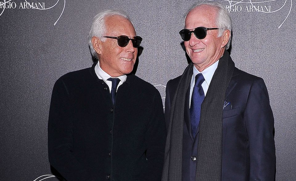 Leonardo Del Vecchio (r.) und Giorgio Armani verdienen beide mit Mode ihr Geld. 19,8 Mrd. US-Dollar für Del Vecchio und seine Familie. Mit Brillen hat Del Vecchio sein Vermögen gemacht. Modedesigner Armani bringt "nur" 8,5 Mrd. US-Dollar auf die Waage.