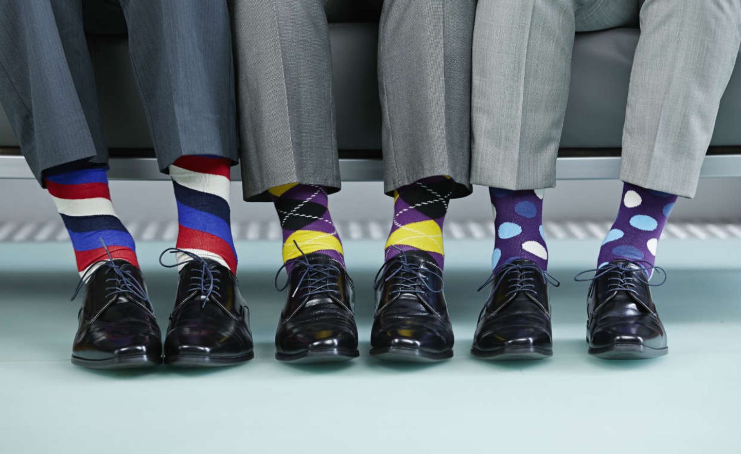 Symbolbild: Socken und Anzüge