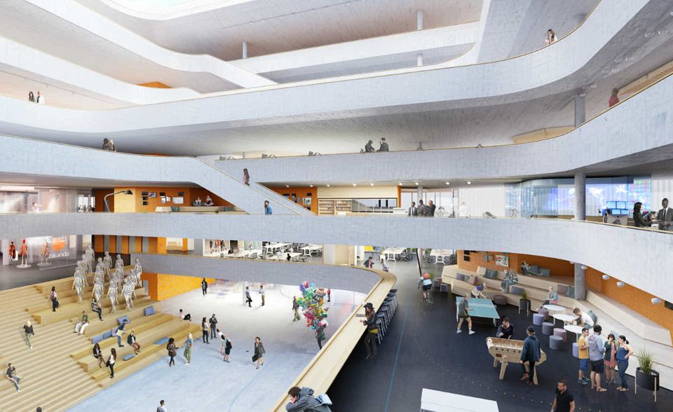 Im riesigen Atrium der künftigen Konzernzentrale sollen Arbeit, Spiel und lockerer Ideenaustausch fließend ineinander übergehen. Das erste Büro wurde im September 2017 bezogen. Die Fertigstellung des neuen Hauptsitzes ist für Herbst 2018 geplant.