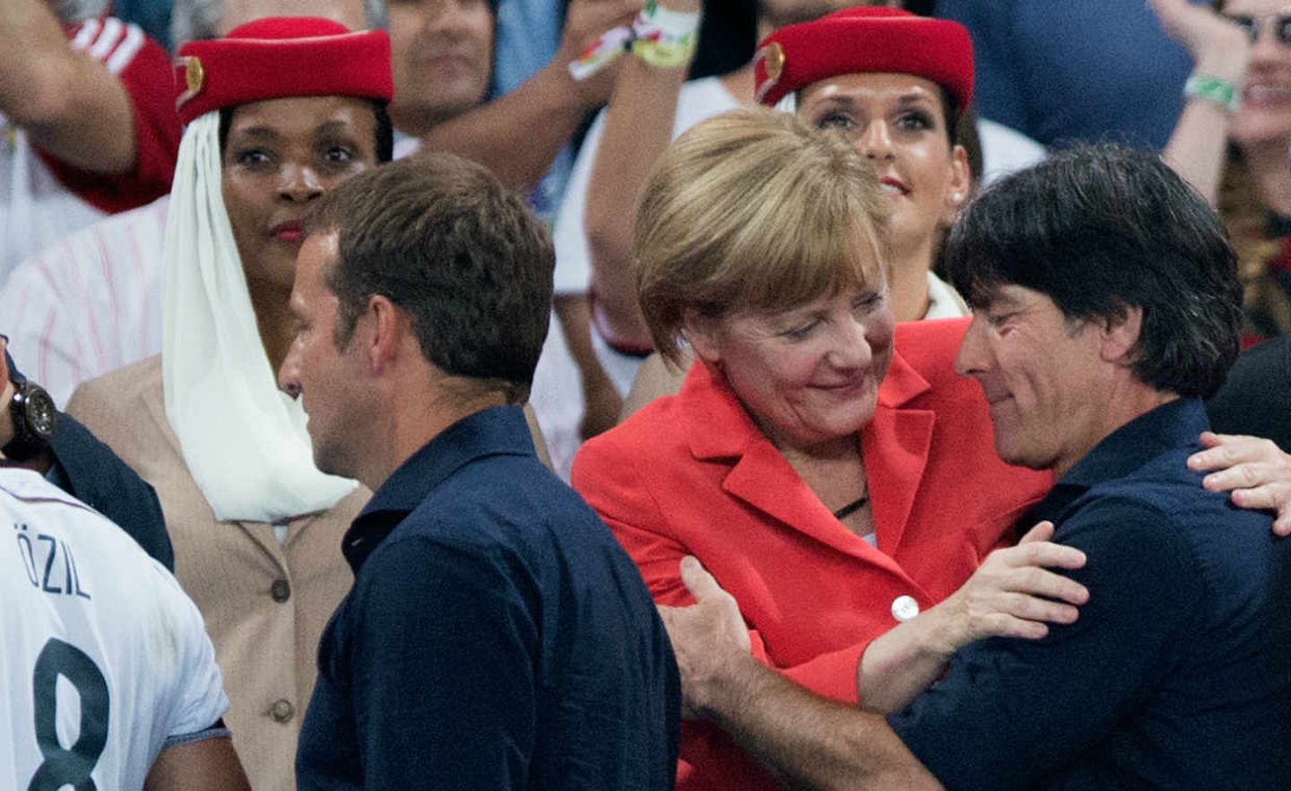 Bundeskanzlerin Merkel und Bundestrainer Löw nach dem gewonnenen Finale bei der Fußball-WM 2014