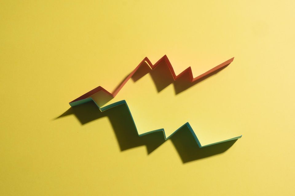 Colourful graphs on yellow background that imitate a bussiness results chart