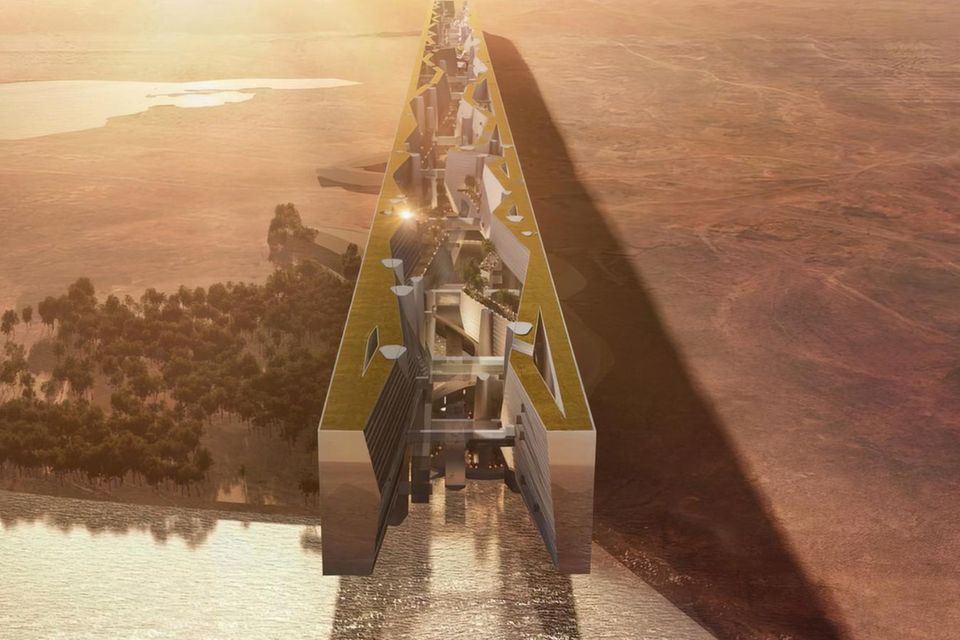 The Line ist die Vision einer klimaneutralen Stadt mitten in der Wüste. Die fertige Bandstadt soll einmal 170 Kilometer lang sein – ohne Straßen, ohne Autos