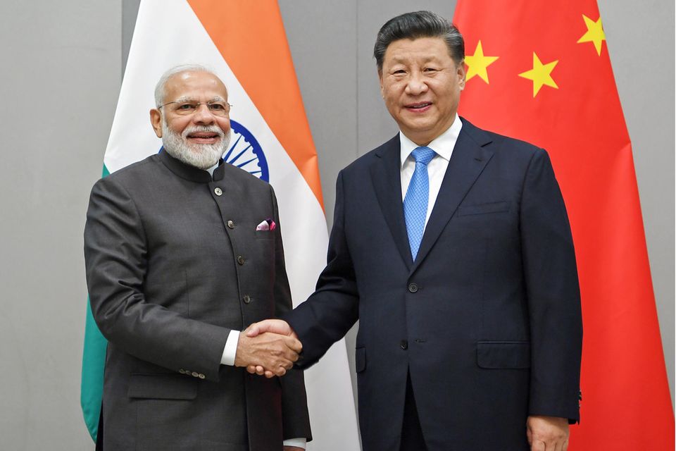 Indiens Premierminister Narendra Modi (links) und Chinas Präsident Xi Jinping 2019 bei einem Gipfeltreffen in Brasilien