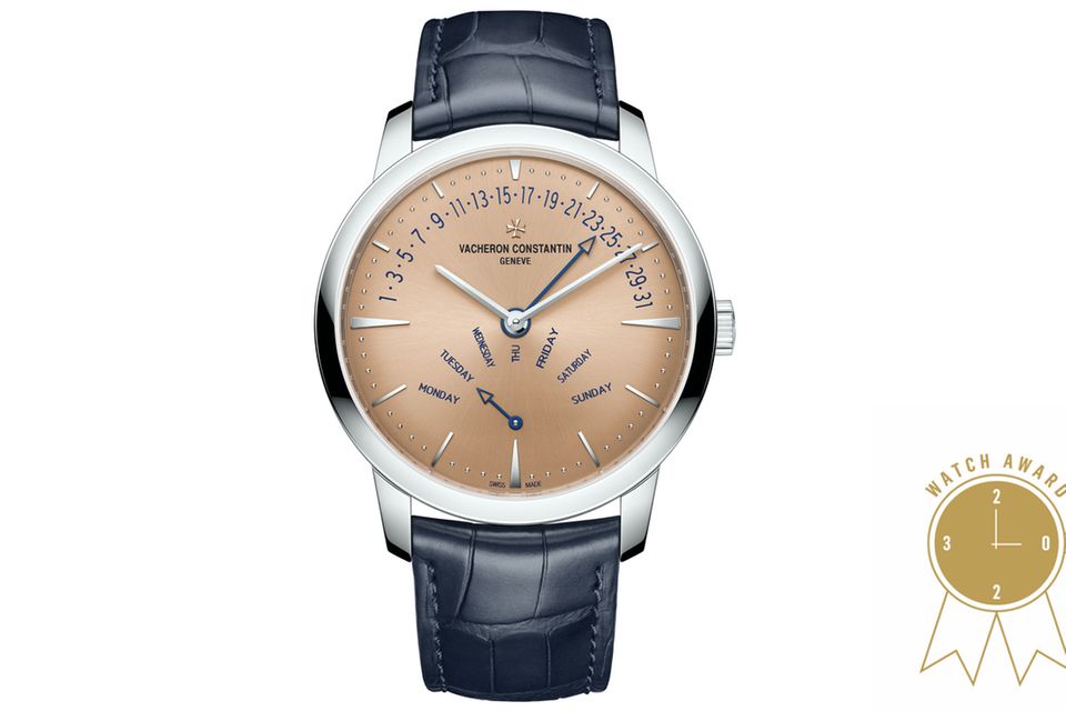 PATRIMONY RETROGRADE DATUMS- UND WOCHENTAGSANZEIGE    WAS DIESE UHR BESONDERS AUSZEICHNET: Die halbkreisförmige Anordnung der zweigeteilten Kalender-Komplikation erinnert an berühmte Modelle der 1920er- und 1930er-Jahre, und auch das roséfarbene Zifferblatt unterstreicht den Stil des Art Déco. Das in Platin verschalte Werk verfügt über 276 Einzelteile.   BASISDATEN (AUSZUG): Kaliber 2460 R31R7/3 (Werk), Platin 950 (Gehäuse), lachsfarbenes Zifferblatt, 42,5 mm Durchmesser, wasserdicht bis 30 m, 40 Stunden Gangreserve.   PREIS: 67.000 Euro