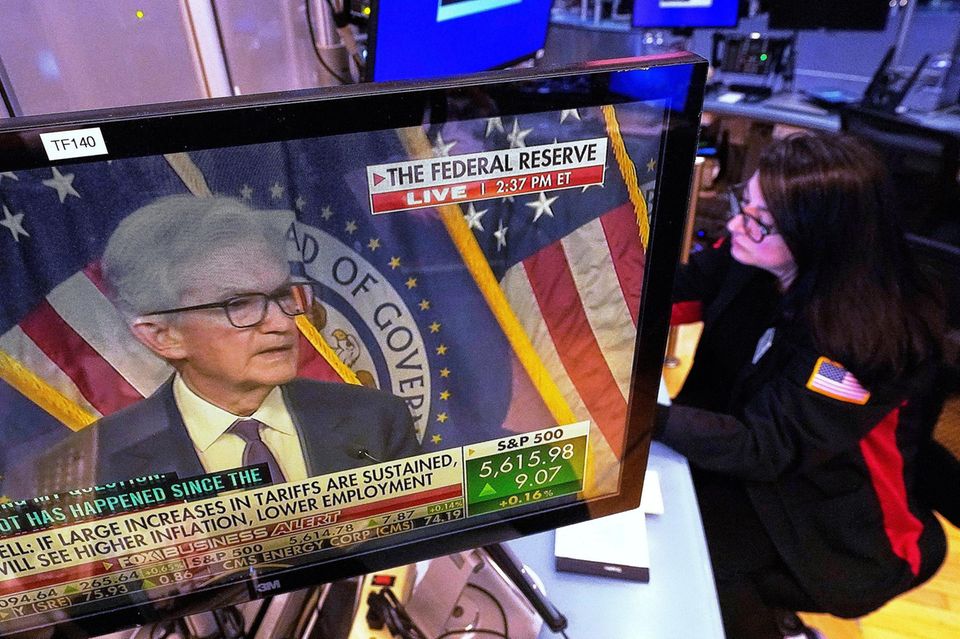 Fed Chairman Jerome Powell is seen on a screen at the New York Stock Exchange
