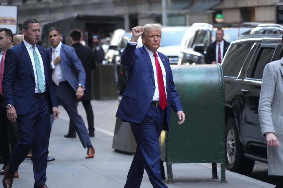 Donald Trump walks on Wall Street