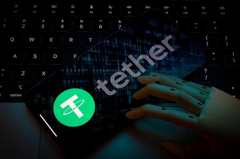 Kryptowährung: Tether-Logo auf dem Bildschirm eines Mobilgeräts