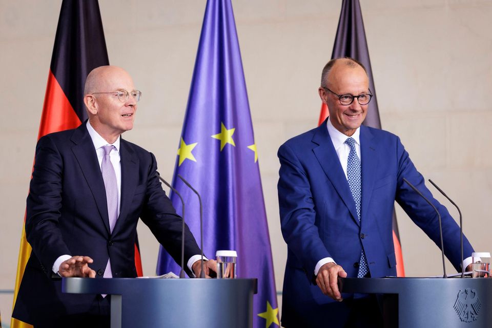 Martin Blessing und Friedrich Merz
