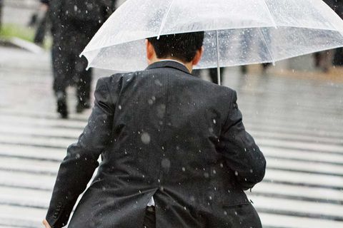 Running Businessman in Tokio